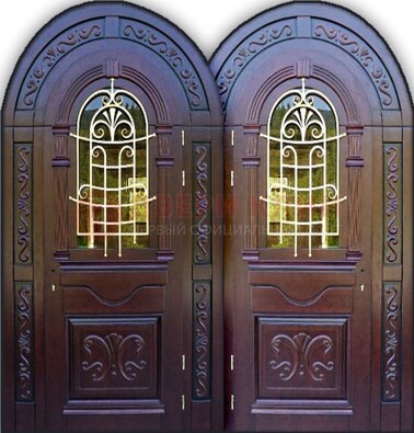 Индивидуальная арочная дверь со стеклом и ковкой ДА-19 в Ставрополе