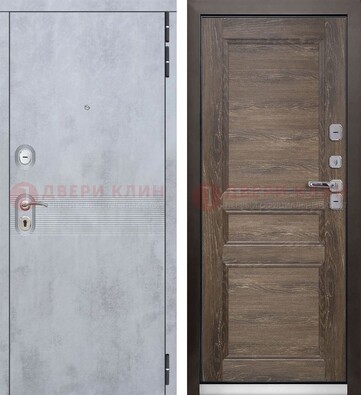 Серая металлическая дверь с МДФ коричневого цвета ДМ-304 в Голицино
