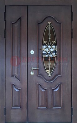 Темная металлическая дверь Винорит со стеклом и ковкой ДСК-239 в Ставрополе